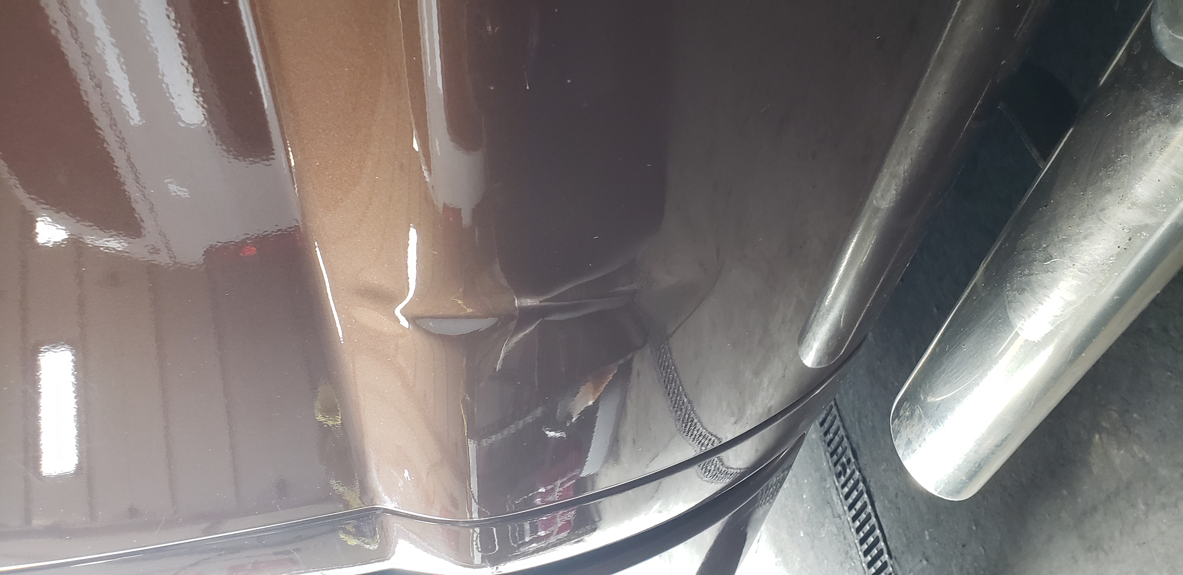 Door panel before dent repair