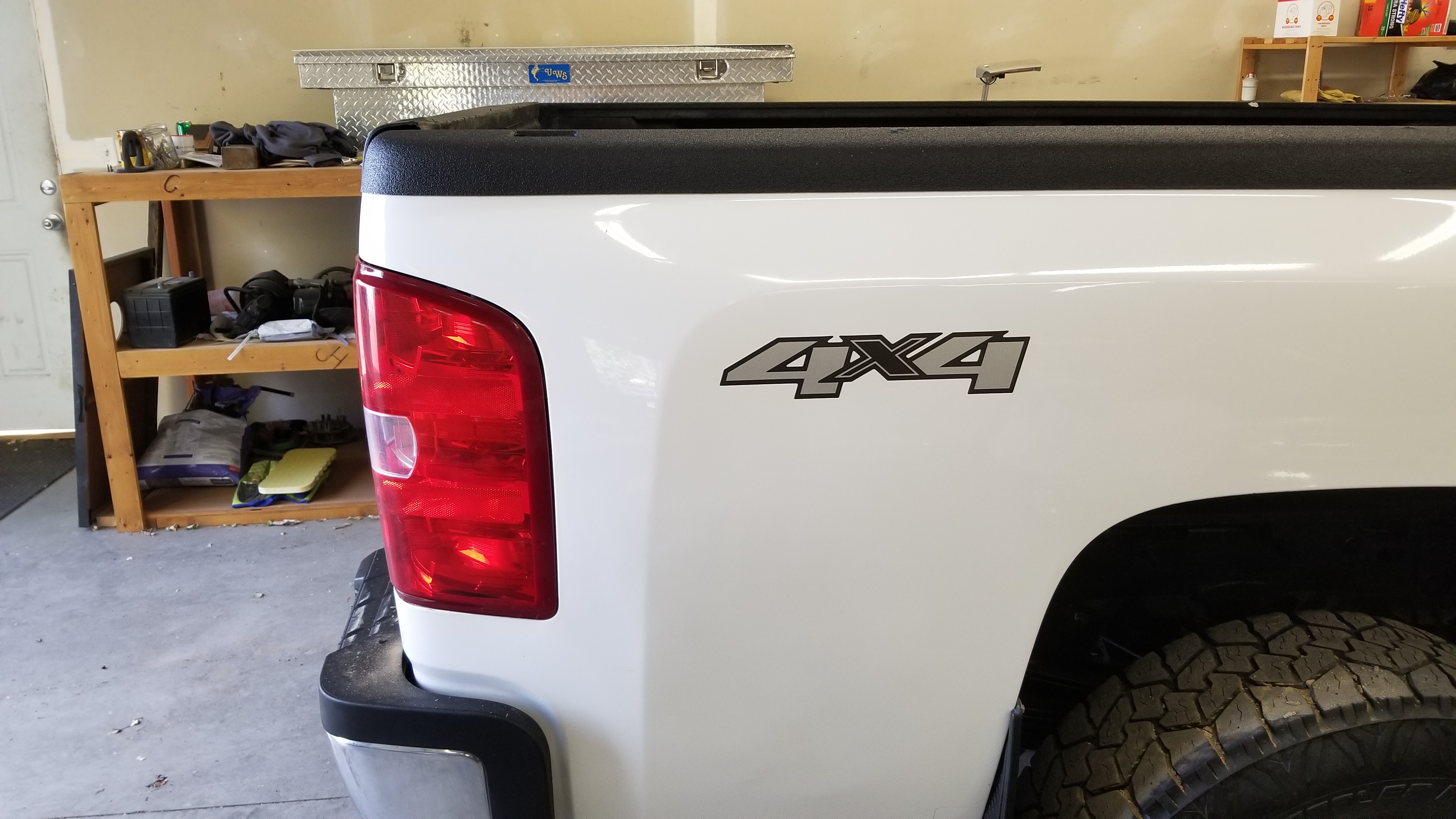 Gray fender crease after paintless dent repair