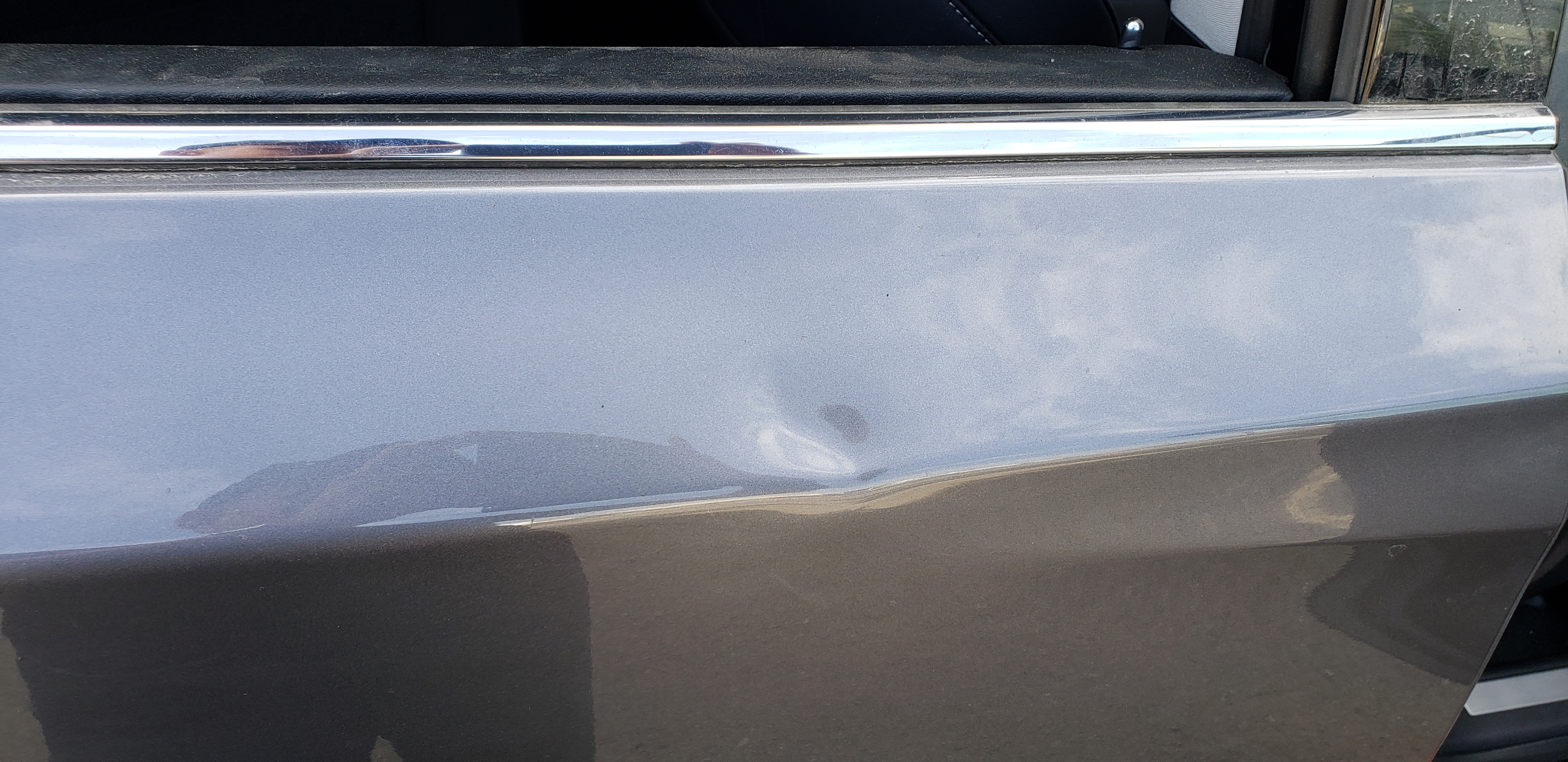 Rear door before paintless dent repair