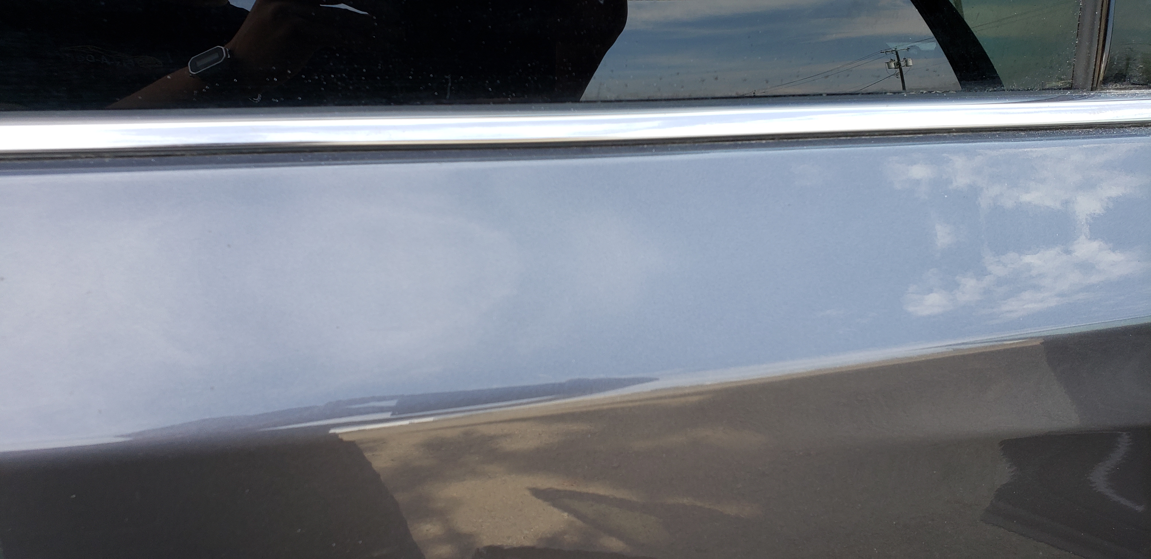 Rear door after paintless dent repair